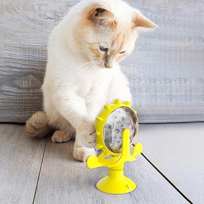 Distributeur WhirlCatFeeder jaune système anti-glouton détaillé