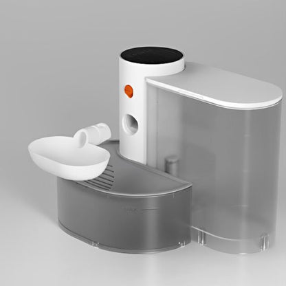 "Vue de dessus d'une fontaine à eau automatique pour chat avec réservoir transparent"